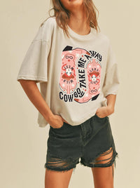 model wearing a cowboy boot graphic tee