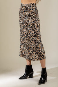 model wearing leopard midi skirt