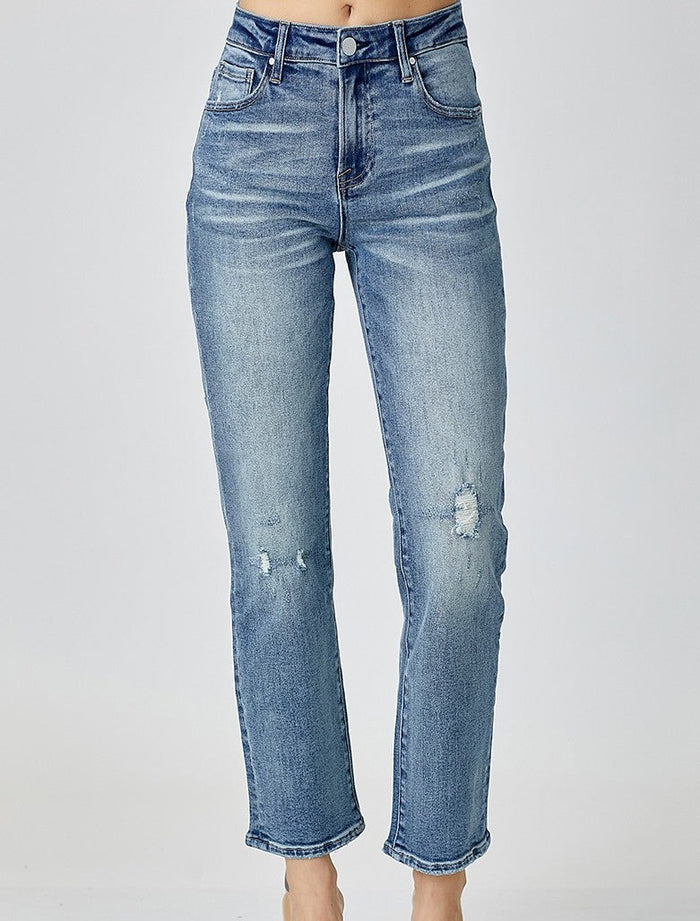 model wearing slim straight leg jeans