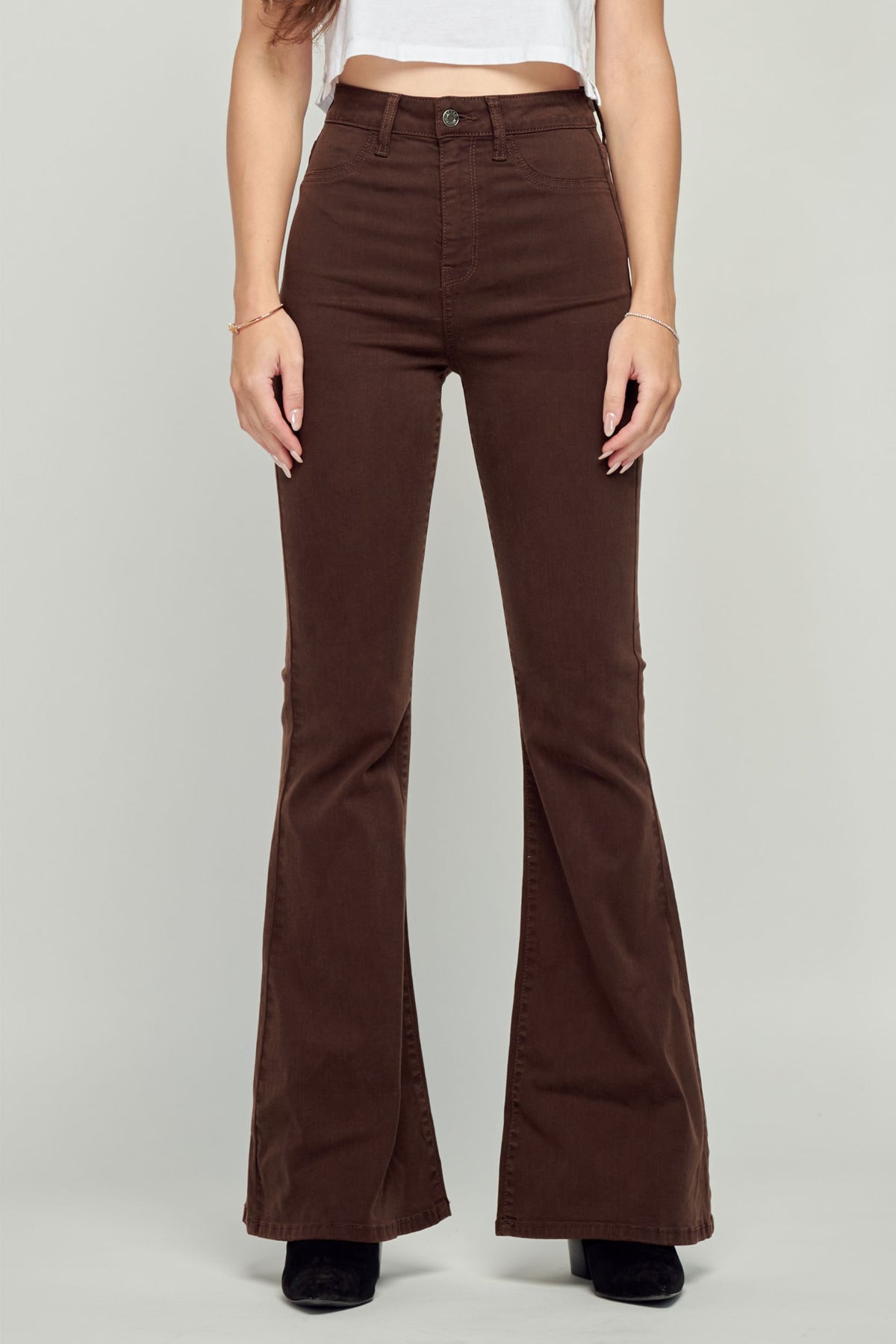 model wearing brown flare pants