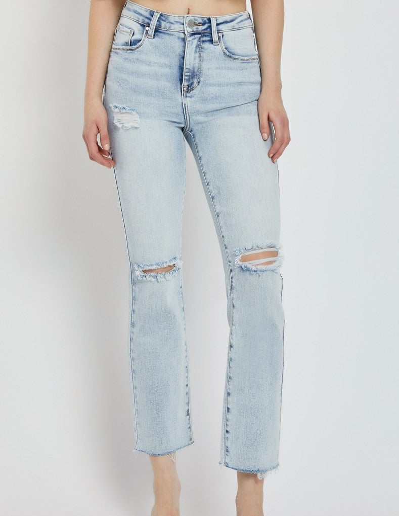 model wearing light wash jeans