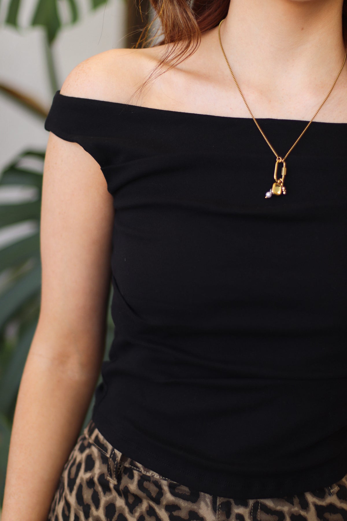 Black Sleeveless Wide Boat Neck Draped Knit Top