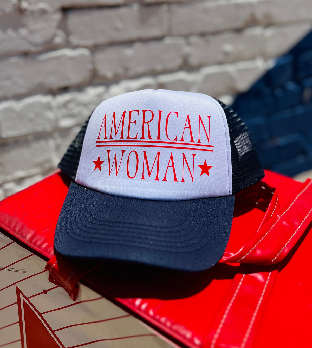 580 Trucker Hat +Navy American Woman
