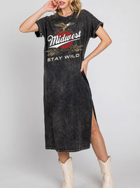 model wearing a mineral washed black graphic tee dress that reads midwest stay wild