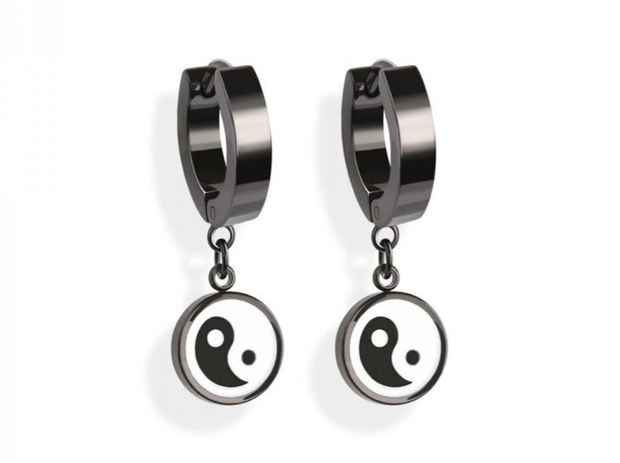 pair of stainless steel black yin yang huggie hoop earrings